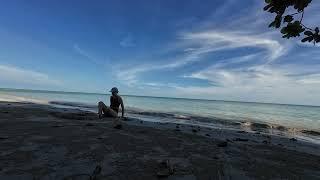 Girl playing with sand on the beach - Koh Samui Thailand