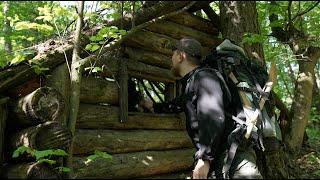 hiding from people in an abandoned hermits log cabin