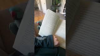 Trying to read, but my parrot is convinced peekaboo is more important! 