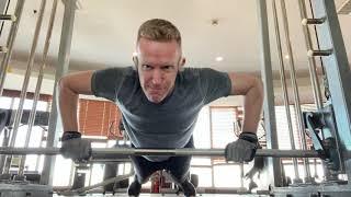 Can Peter Sobol do 50 pull ups and 100 push-ups in under 5 minutes?