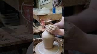 throwing a tall vase on the potters wheel. #art #artist #handmade #wheelthrown #asmr #clay