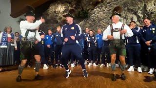 Moves like McGinn  Scotland midfielder throws some SHAPES on arrival in Germany