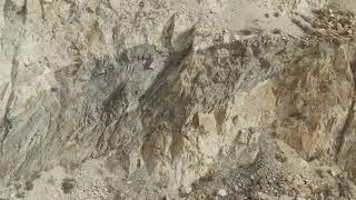 Los Frailes pit walls with massive sulphides (VMS) in dark (Emerita Resources)