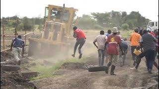 Drama as Gikumari Residents in Ruiru Chase away Govt Earthmovers Constructing Roads on Their Plots