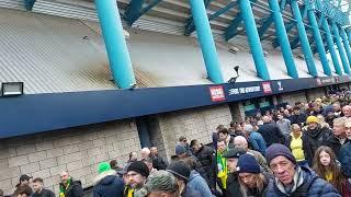 Cheering Norwich fans leaving the New Den victorious after Norwich's 3-2 win over Millwall 04/03/23