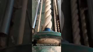 Transforming wood: innovative machine weaves and twists for unique, pliable designs.