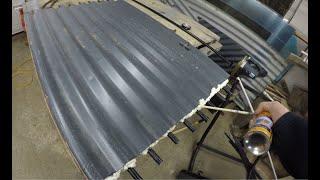 Corrugated roofing metal and sand turned into a solar water heater, How I've assembled it.