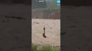 How China Uses Drones To Rescue Couple Trapped In Gushing Floods