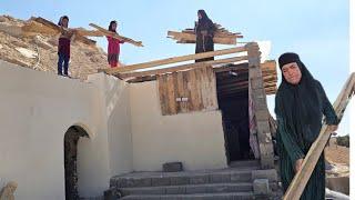 Grandmother's masterpiece: collecting wood from government demolitions to cover the roof