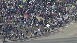 Raw aerials: Hundreds gather near NOAA Boulder campus in protest of federal cuts to the agency