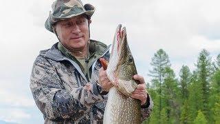 Vladimir Putin catches pike on Russia fishing trip