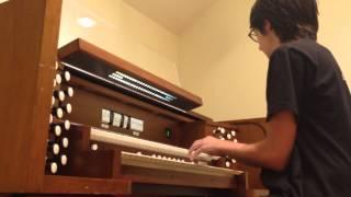 Playing on a Practice Organ at the Lamont School of Music