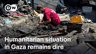Dozens of Gazans waiting for aid killed by gunfire | DW News