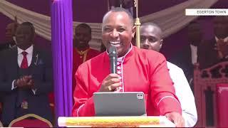 Bishop Ben Kiengei welcomes and ordain the oldest Jcm Pastor.
