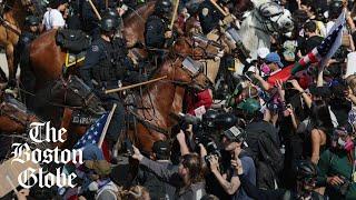 Los Angeles police use tear gas, horses to clear anti-Trump protesters