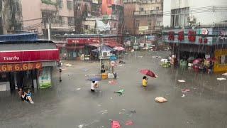 In China now! Hundreds of cars and buildings submerged, ship trapped under bridge in Guangdong