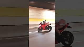 lady biker driving fast