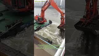 Navigating the Waters: Excavator Dredging in Riverbeds