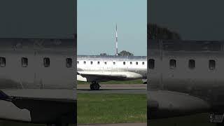 Unpainted CRJ-900 Taxiing at Norwich Airport