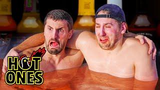 The Ultimate Hot Ones Challenge In A Hot Tub!