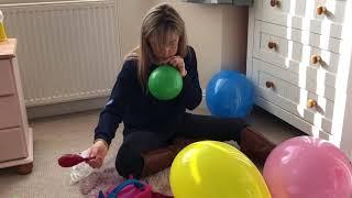 Standard coloured balloon blowing up and reviewing them