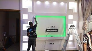 installation of gypsum board tv unit POP design or modern wall tv cabinet interior design ideas