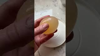 TURN AN UNCOOKED EGG INTO A RUBBER BALL.