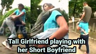 Tall girlfriend playing with her boyfriend | tall woman short man