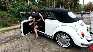 Nicky revving and driving VW Bug