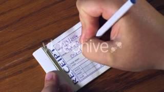 Receipt Book [STOCK FOOTAGE]