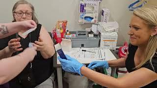 Mom (Janna Hatzenbeller), Dad (Gary Gould) and Addison Getting Their Flu Shots at Walgreens