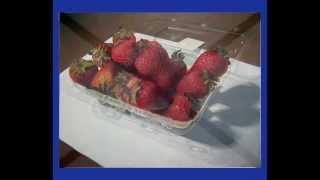 Strawberries in a transparent plastic box - steps of painting