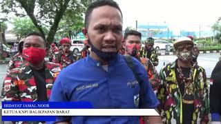 WARGA BALIKPAPAN GELAR BAKTI SOSIAL BAGI MASKER DAN BROSUR PROTOKOL KESEHATAN