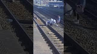 Shocking moment woman drags stroller with 2 children across train tracks