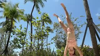 Doing some gymnastics at my beach/pool