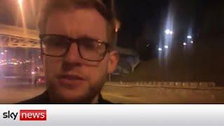Armed Ukrainian politician patrols Kyiv