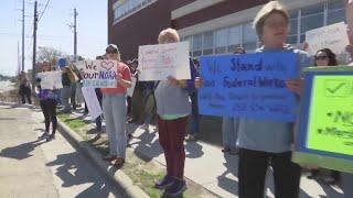 People protest against layoffs to NOAA and National Park Workers