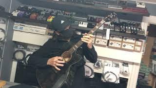 Michael Sweet of Stryper signs his signature acoustic guitar at Guitar Pedal Shoppe.