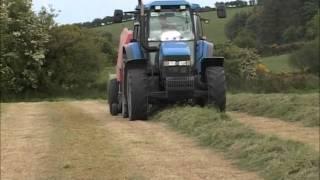 New Holland TM150 with Kuhn baler