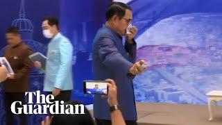 Thai PM sprays disinfectant on journalists at press conference