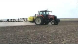 Buhler Versatile 2145 Tractor spraying with a 3 point Top Air Sprayer