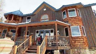 Woodworker creates unique home from grain elevator scrap