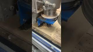 Big CNC cutting a template