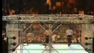 Jeff Hardy does a whisper in the wind to Umaga off the cage