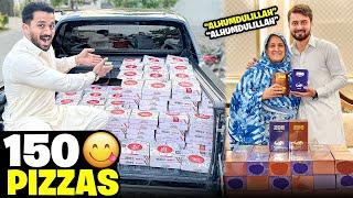 Surprise on 2nd Anniversary of Rajab Family  150 Pizzas Distributed 