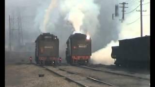 Chinese Steam - Various JS & QJ locomotives perform the morning parade at Pingdingshan, China