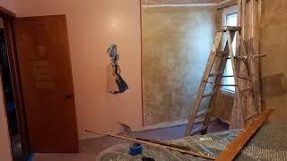 demo of a wall to combine two rooms