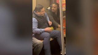 Straphanger fights back after getting hit in the face by another rider