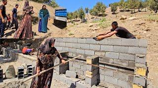 Rural family routine.  Babak is building a new terrace and the children are helping him