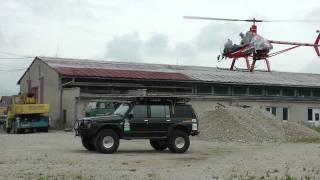 Helicopter landing on the roof of the Nissan Patrol